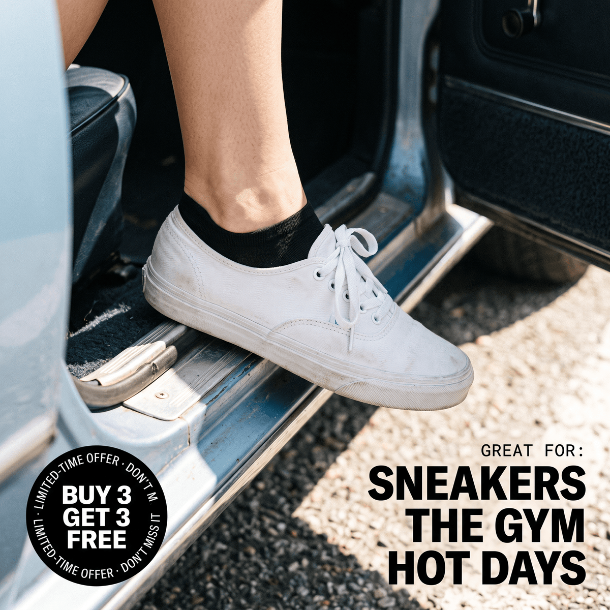 Foot on car doorsill wearing white sneaker with black alpaca no-show sock